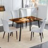 One table and 4 light gray PU chairs. Rectangular tea brown glass dining table, tempered glass tabletop and black metal legs, suitable for kitchen