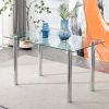 Modern minimalist glass dining table. A transparent tempered glass desktop with a thickness of 0.3 feet and metal legs. Suitable for restaurants and l