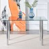 Modern minimalist glass dining table. A transparent tempered glass desktop with a thickness of 0.3 feet and metal legs. Suitable for restaurants and l