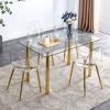 Modern minimalist glass dining table. A transparent tempered glass desktop with a thickness of 0.3 feet and metal legs. Suitable for restaurants and l